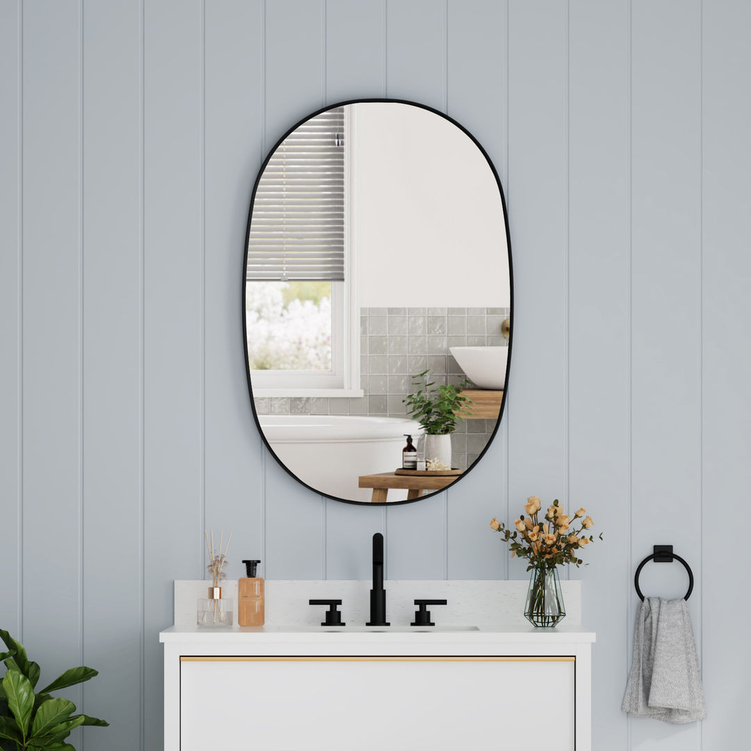 24 in. W. x 36 in. H Oval Framed Wall Bathroom Vanity Mirror in Matte Black